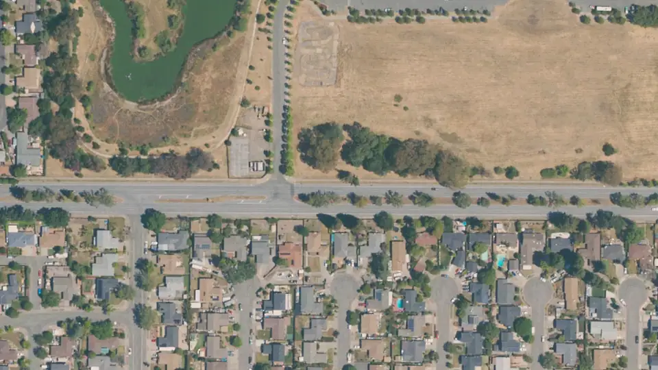 Aerial view of A Place to Play Community Park and its surroundings